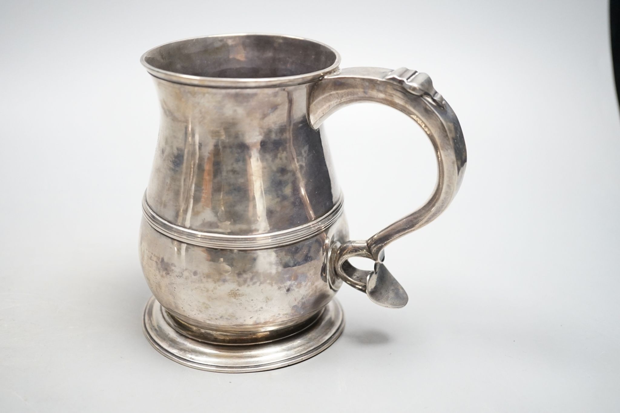 A George II silver baluster mug, with banded girdle, Benjamin Cartwright I, London, 1751, 12.2cm, 10.5oz.